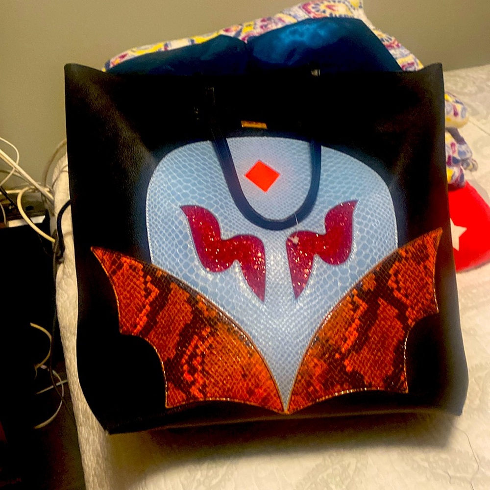 Tote bag from Stella McCartney for all your stuff; has plenty of space